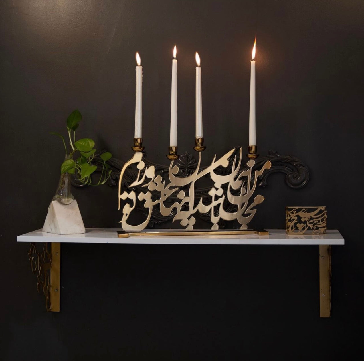 Calligraphy candle holder
