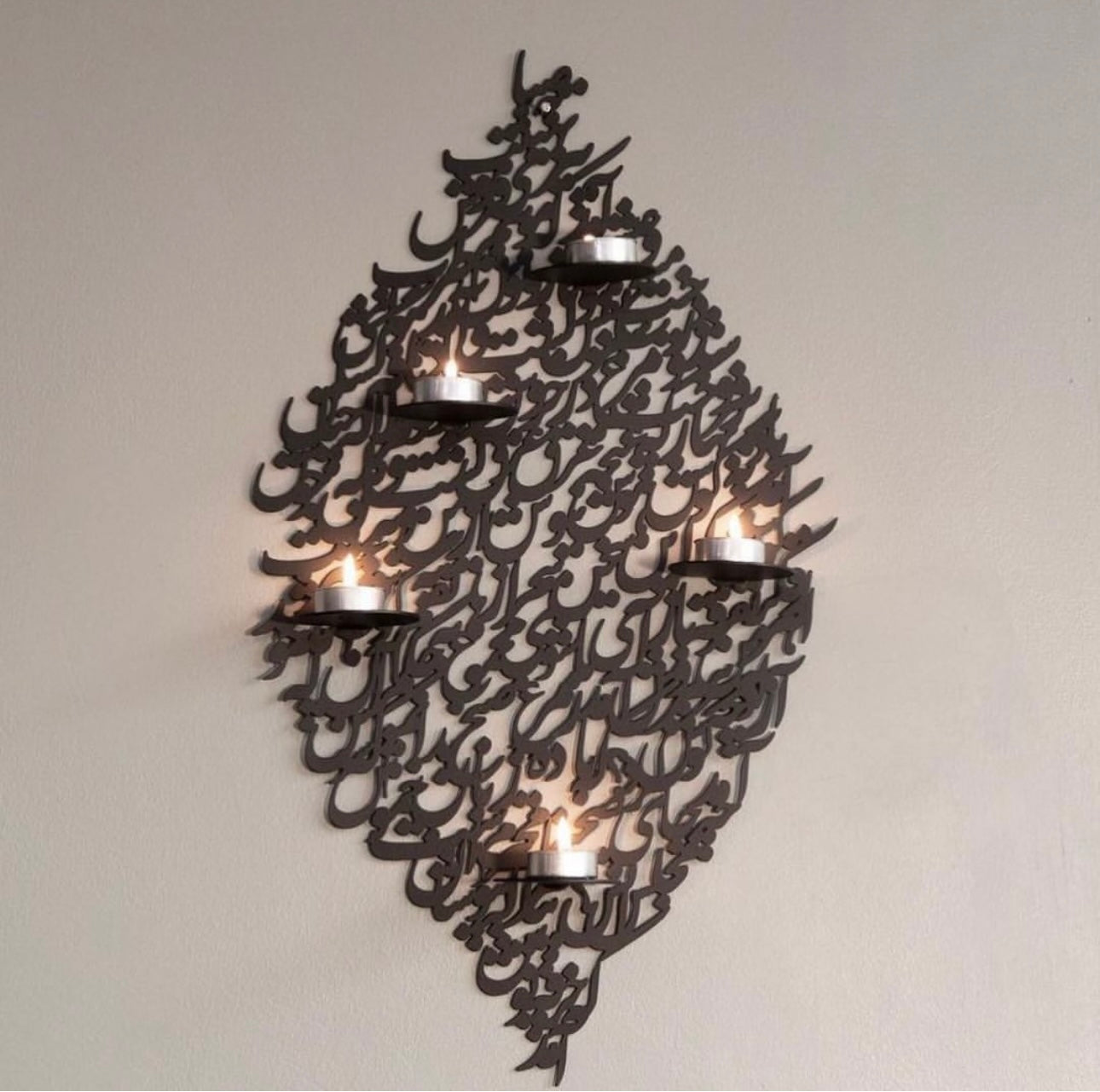 Calligraphy metal wall art and candle holder